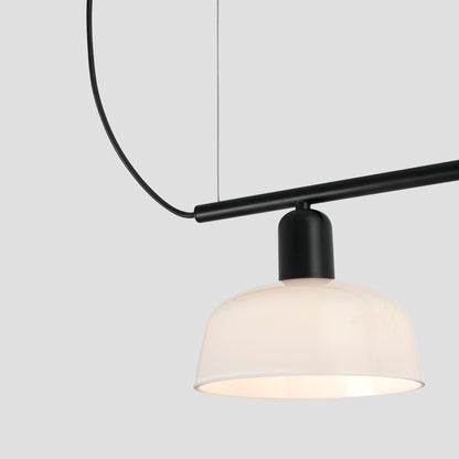 Close up of shade on Faro Barcelona Tatawin medium 3 light linear pendant in White