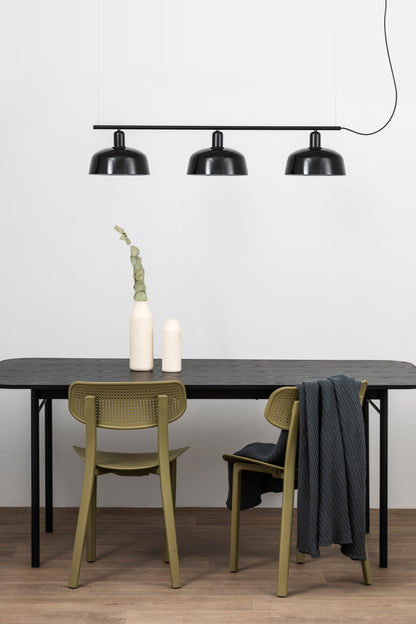 Faro Barcelona Tatawin medium 3 light linear pendant in Black hanging over a dining table