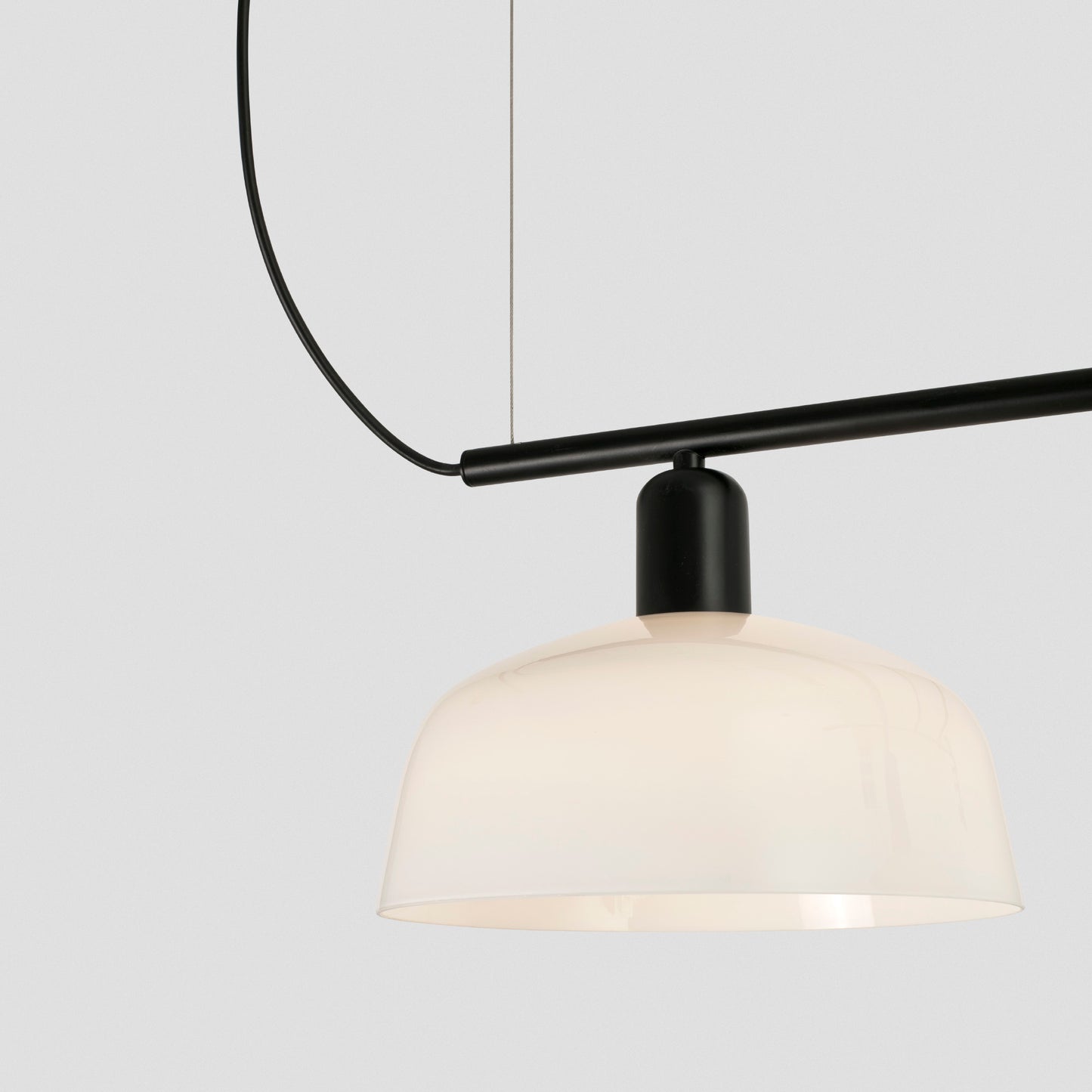 Close up of shade on Faro Barcelona Tatawin medium 3 light linear pendant in white