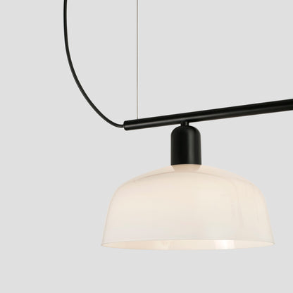 Close up of shade on Faro Barcelona Tatawin medium 3 light linear pendant in white