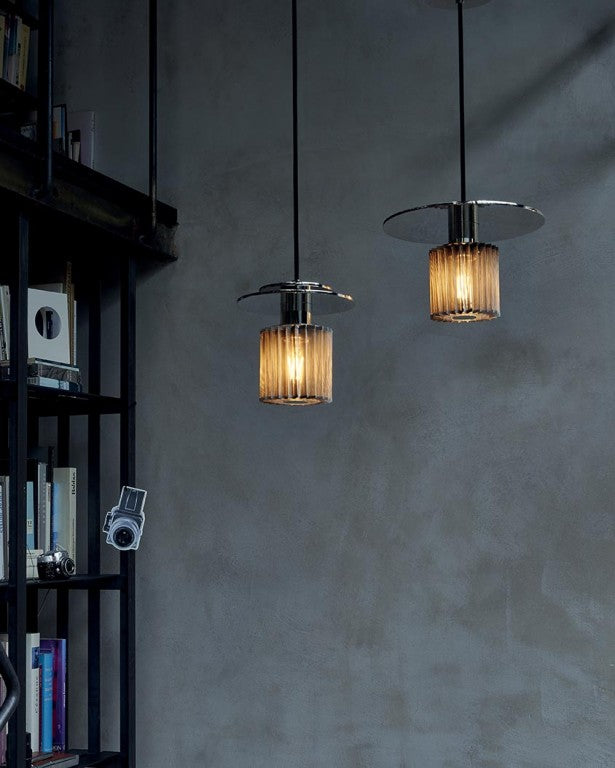 DCW Editions In The Sun Pendant 190 2 next to book case
