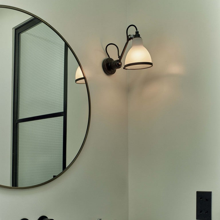 DCW Editions Lampe Gras No.304 bathroom in Polycarbonate next to mirror