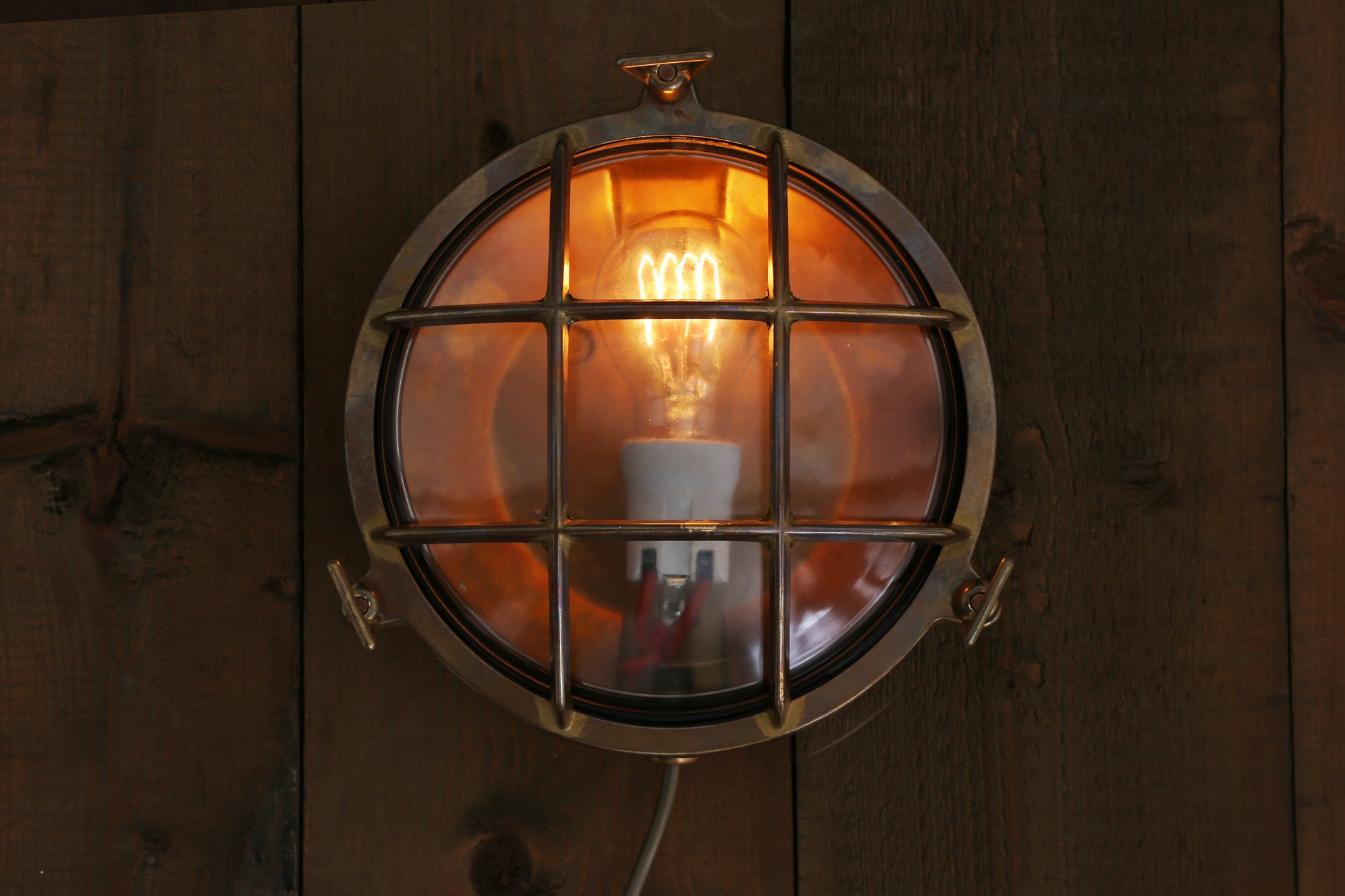 Mullan Lighting Adoo Nautical Bulkhead wall light in Natural Brass and Clear Glass
