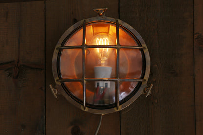 Mullan Lighting Adoo Nautical Bulkhead wall light in Natural Brass and Clear Glass