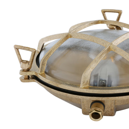 Side view of Mullan Lighting Adoo Nautical Bulkhead wall light in Natural Brass and clear Glass